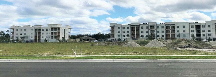 The Plaza at Founders Square retail center will be built on this lot in front of The Pearl apartments in North Naples. TIM ATEN / FLORIDA WEEKLY